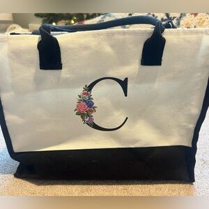 Black and white “C” floral medium size bag with wallet